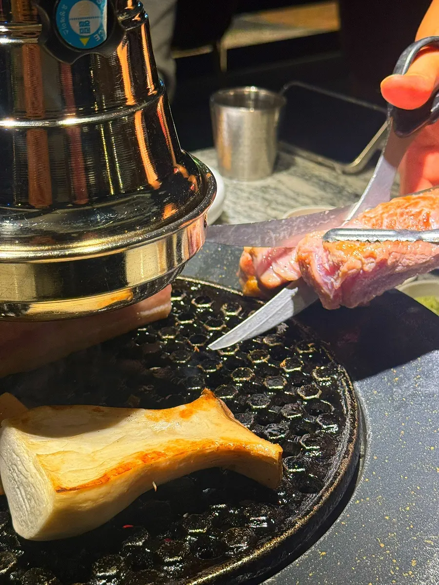 Thick cuts of pork on the charcoal grill