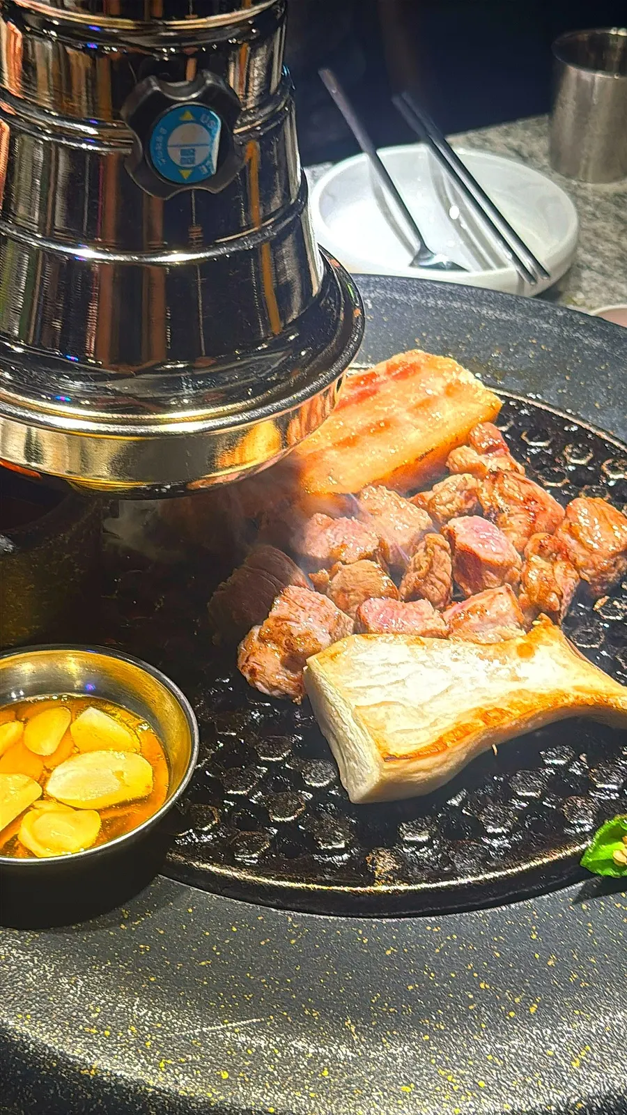A piece of pork belly dipped in salt