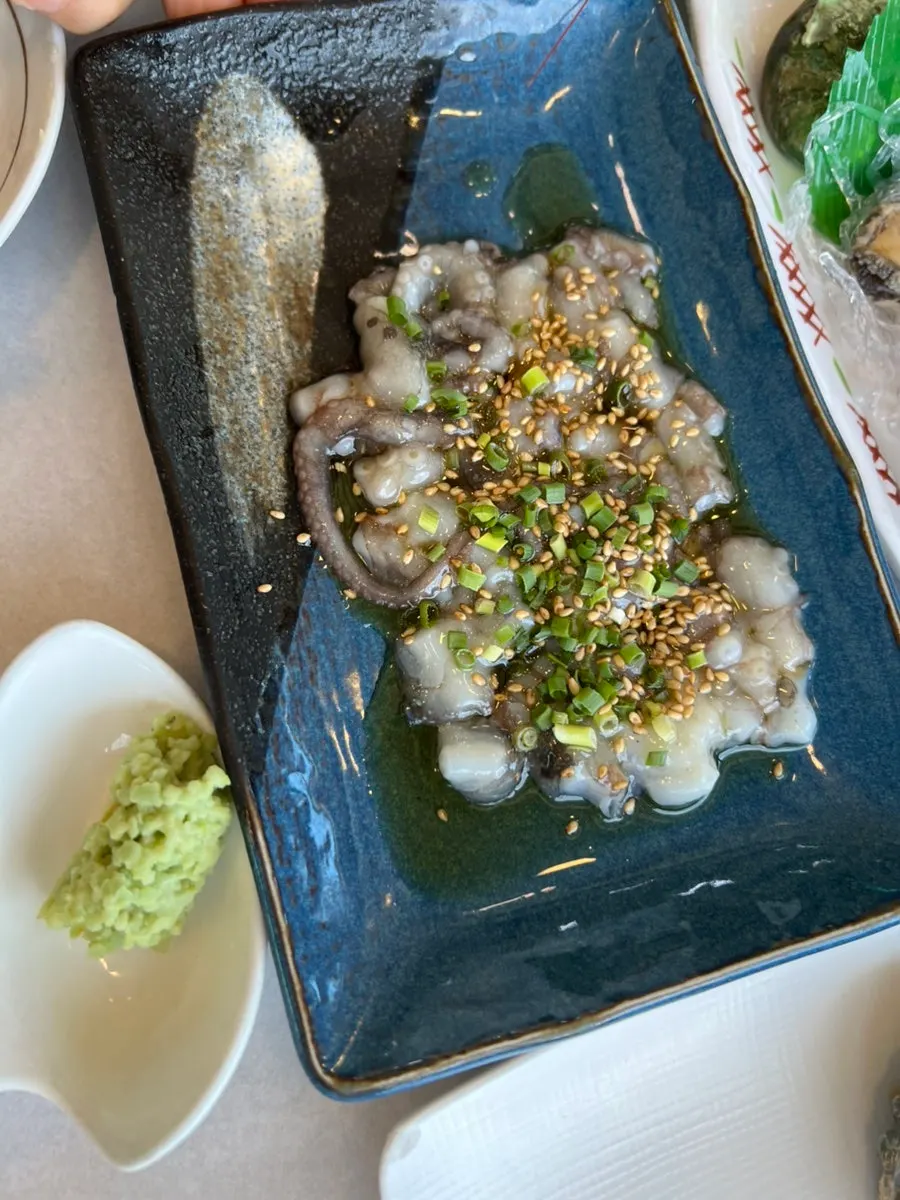Assortment of sea squirt and conch sashimi