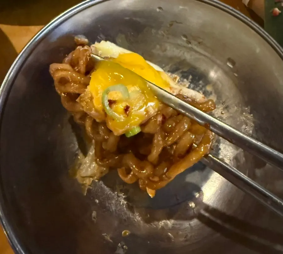 Buldak Gyeti topped with soft-boiled egg