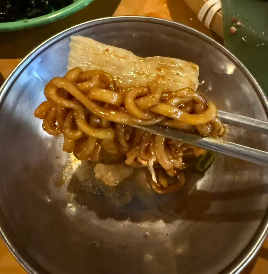 Close-up of mixed Buldak Gyeti noodles