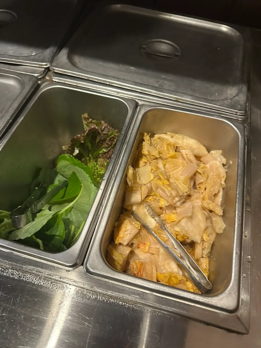 Self-serve bar with ssam vegetables and side dishes