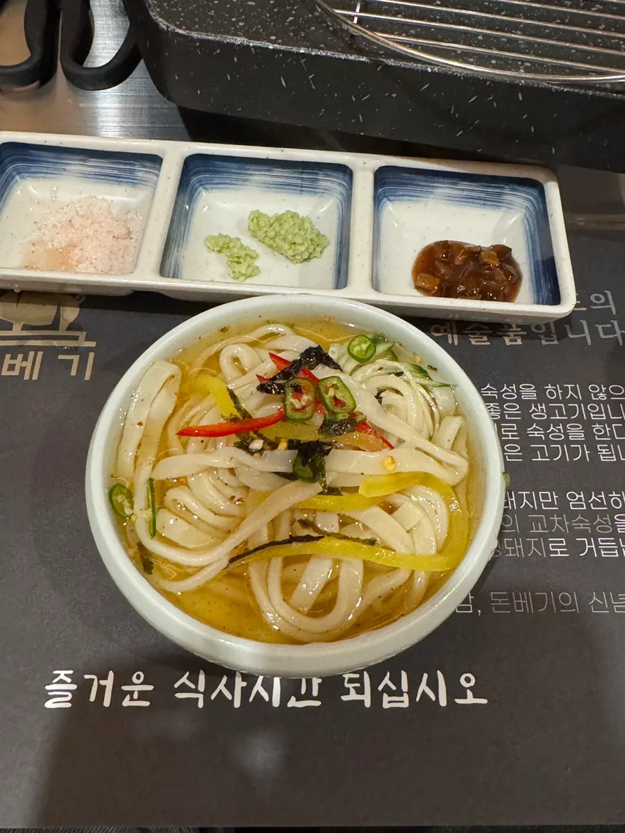 Cold kimchi kalguksu with chilled kimchi broth