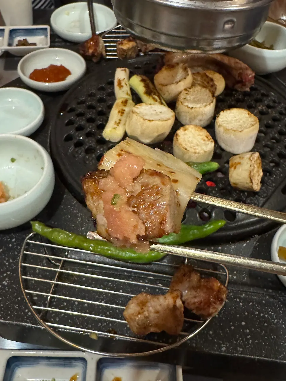 Table with French rack and side dishes laid out