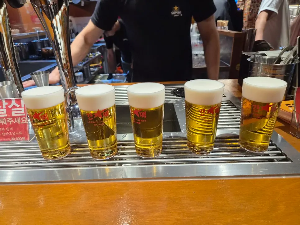 Glass of draft beer dipped in ice water