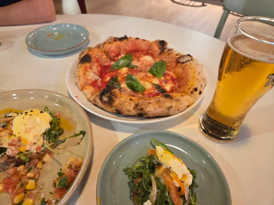 Salmon eggs Benedict and Margherita pizza order