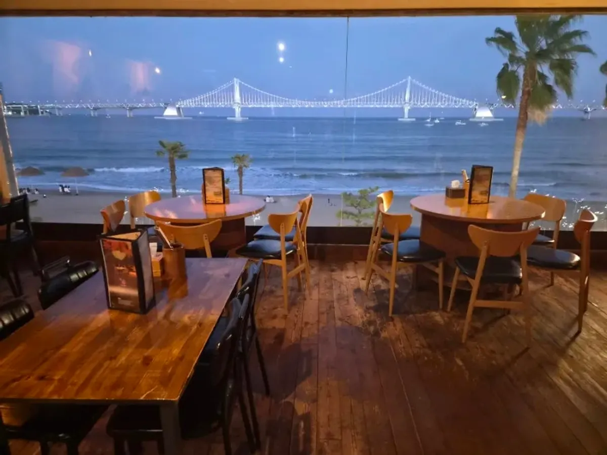 Gwangalli's sea and Gwangan Bridge view through the floor-to-ceiling window