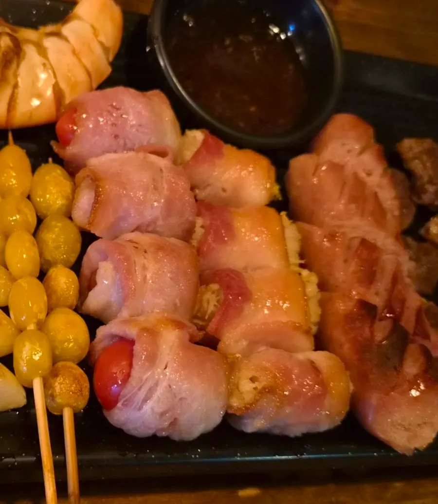 Close-up of the mixed skewer ingredients on one plate