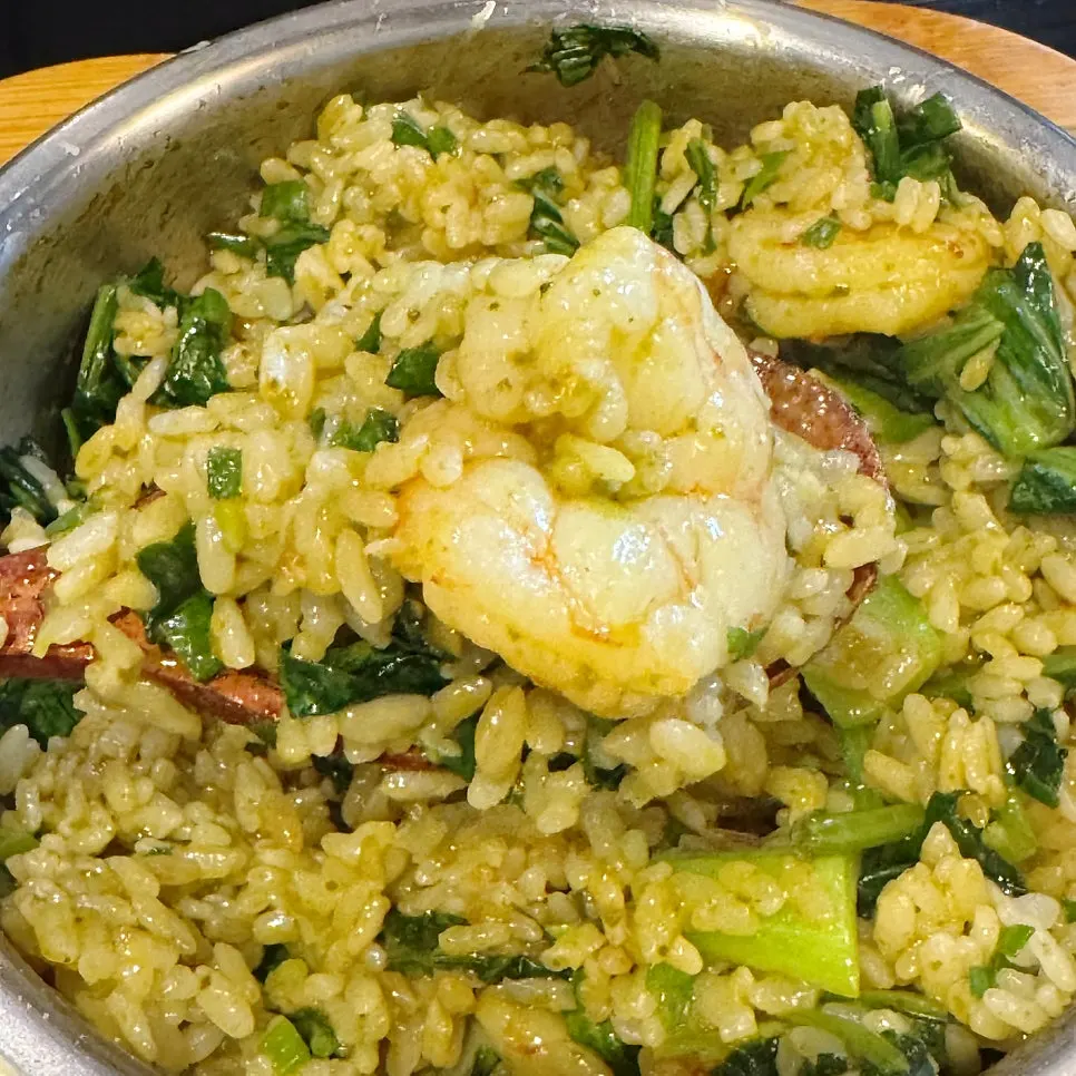 Lobster shrimp pot rice topped with abalone innard sauce and cheese