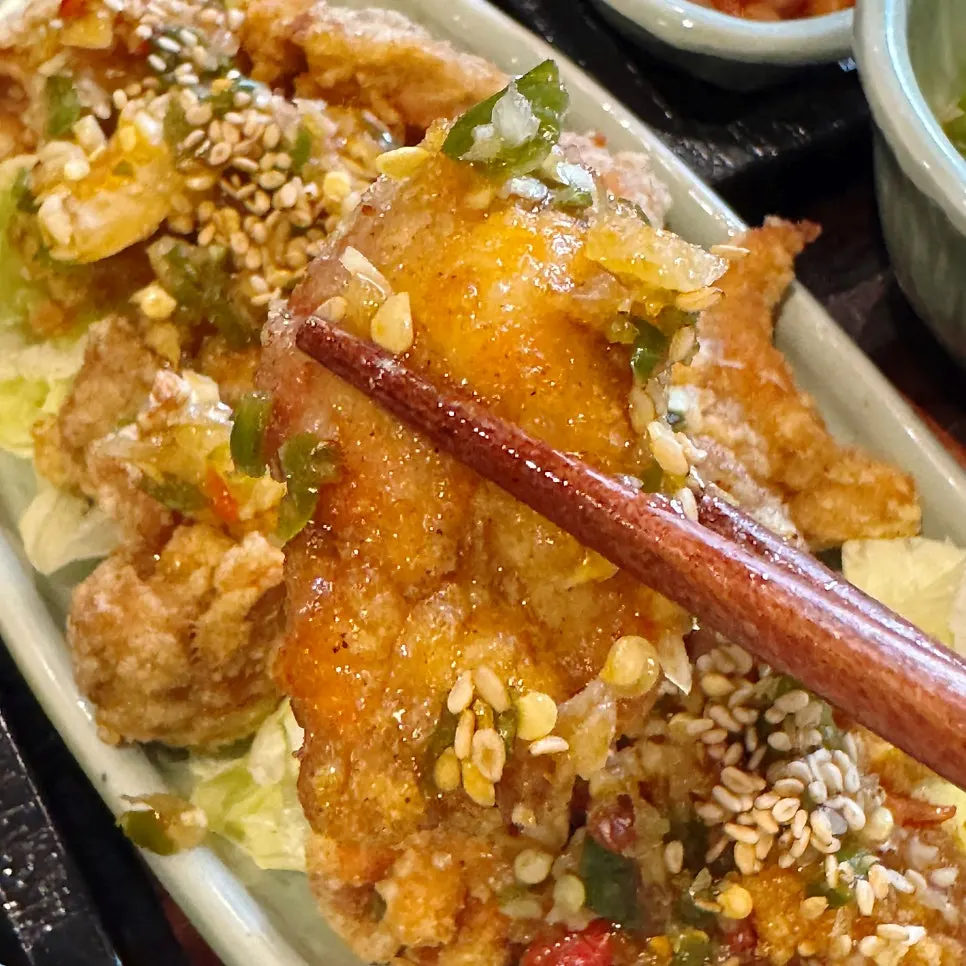 Close-up of yurinji coated in tangy sweet sauce