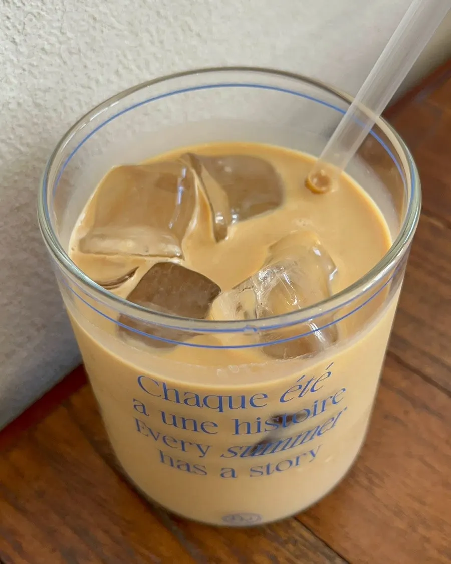 Iced café latte served alongside the desserts