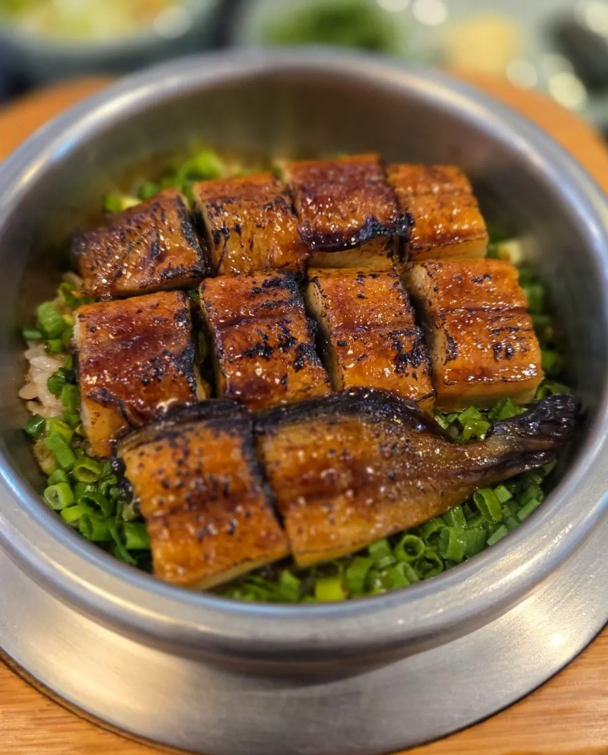 Vertical photo of the pot rice table setting at Solsot Gwangalli