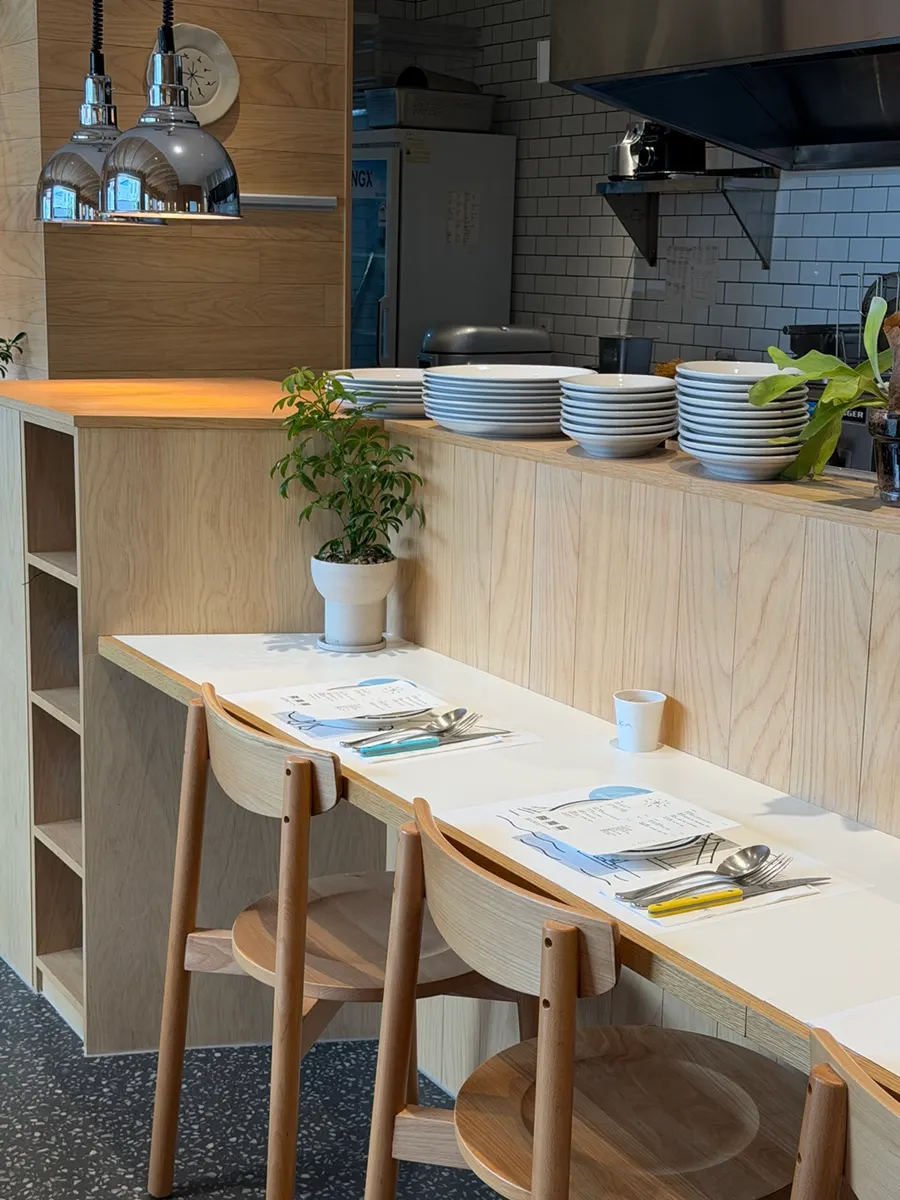 Seating and interior toward the back of the restaurant