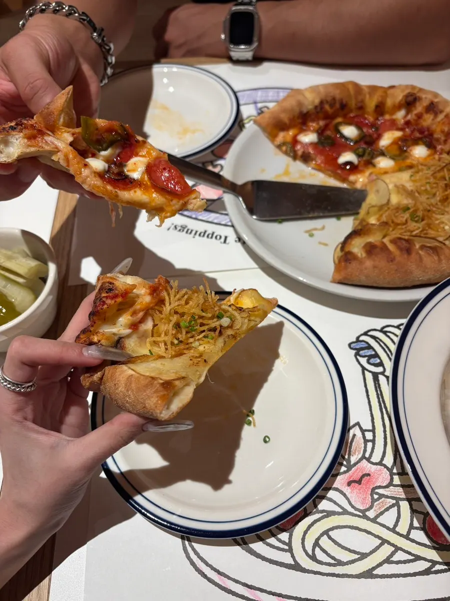 A slice of pizza folded in half