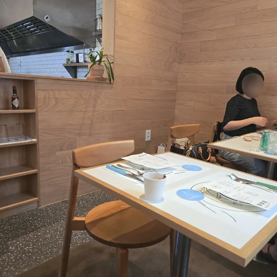 Wood-toned interior of Extra Mile