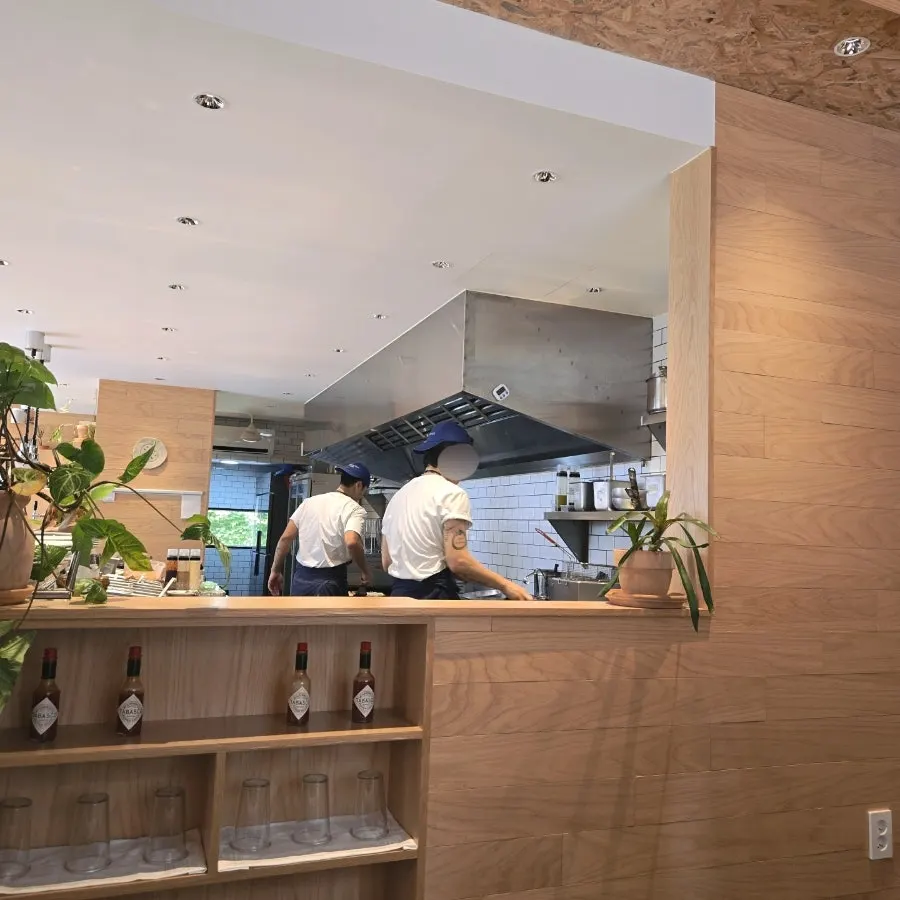 Neatly organized open kitchen at Extra Mile