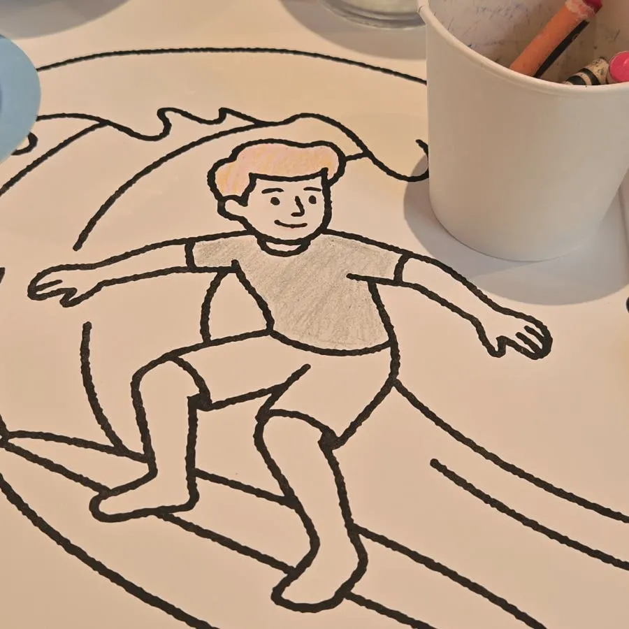A coloring page filled in while waiting for food