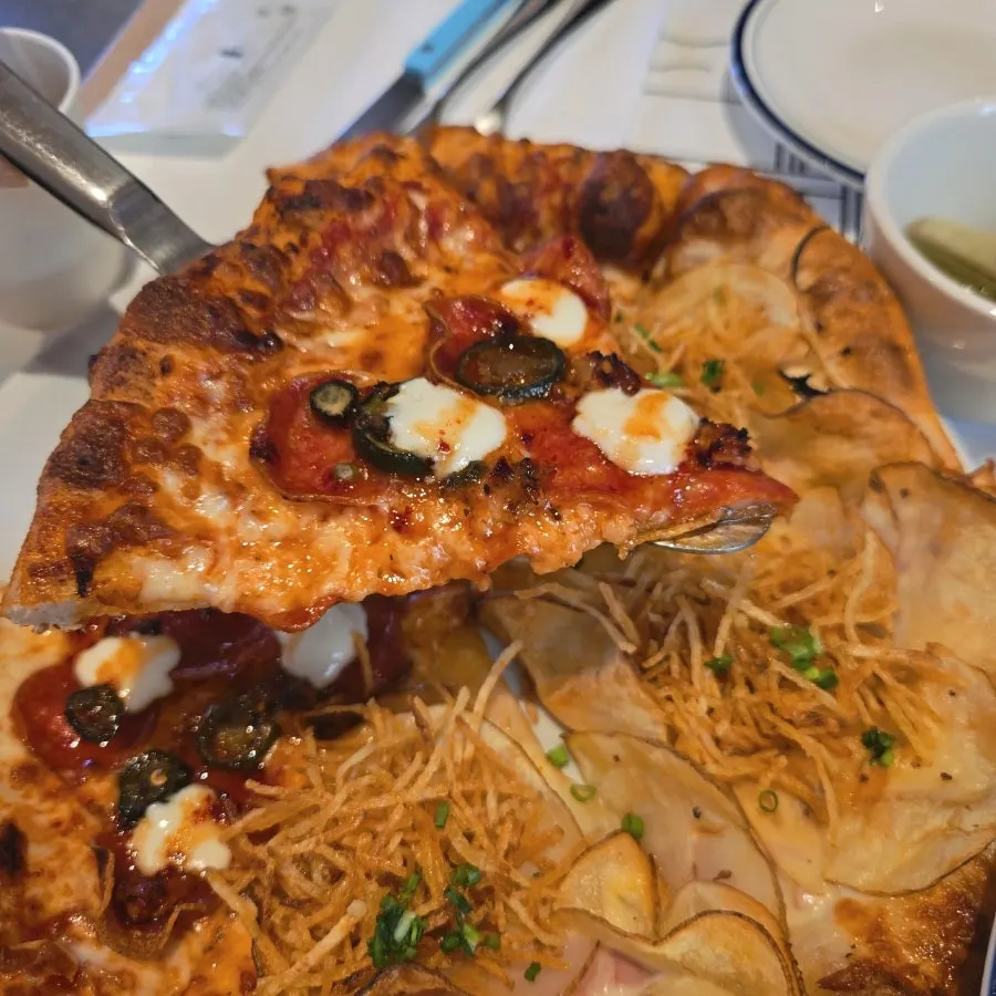 Half of the hot honey pepperoni pizza