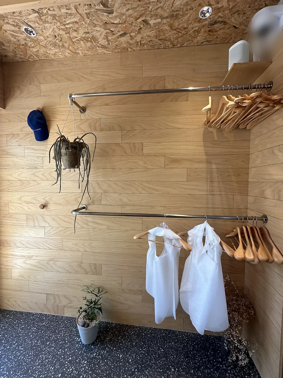 Coat hangers at the store entrance