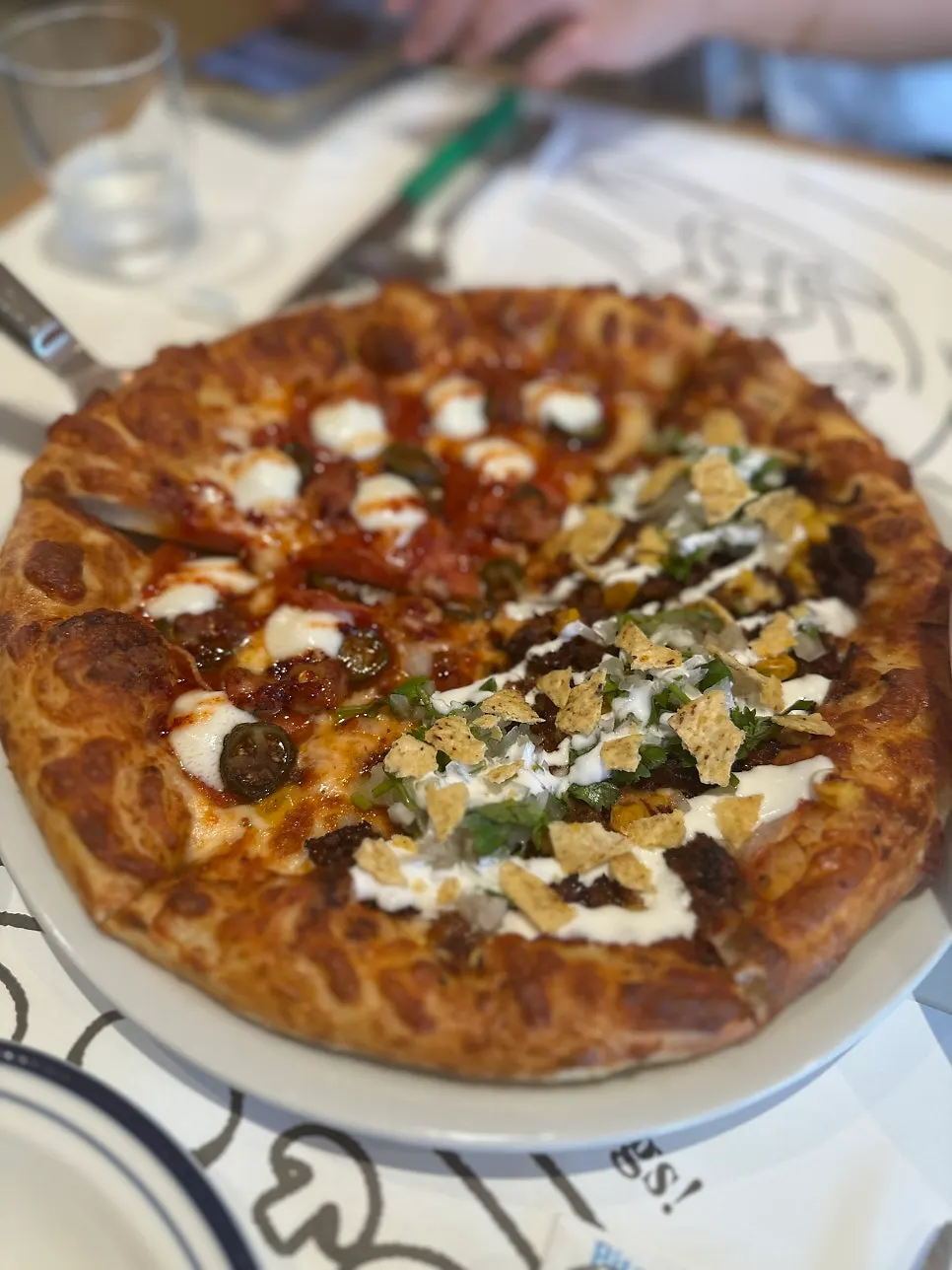 Half-and-half hot honey pepperoni and birria taco pizza
