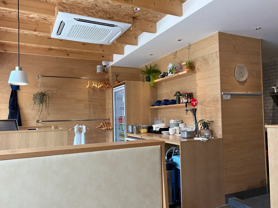Extra Mile interior showing the open kitchen