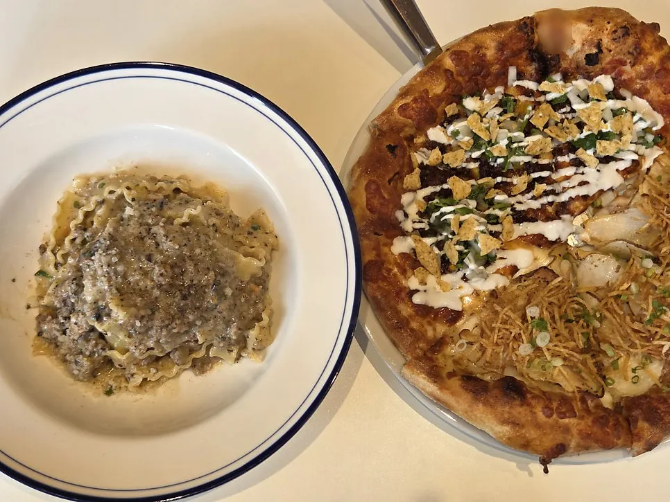 Potato pizza topped with shredded potato and potato fries