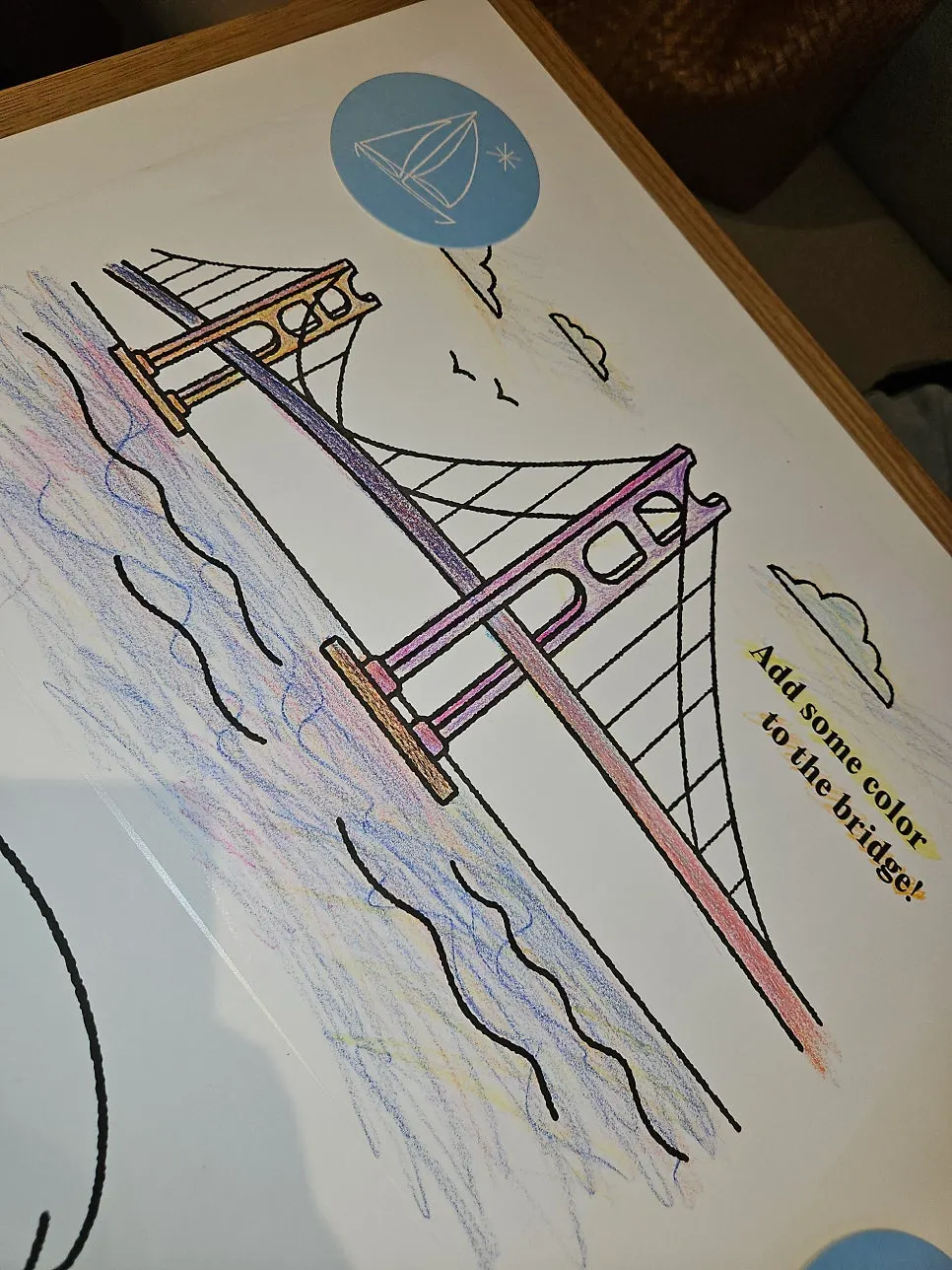 Colored pencils and drawing paper set on the table