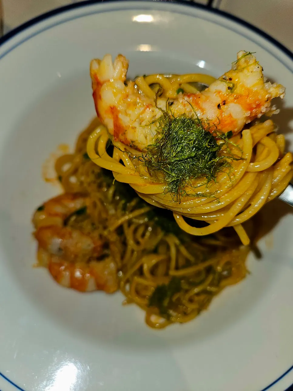 Pasta noodles soaked in cream sauce