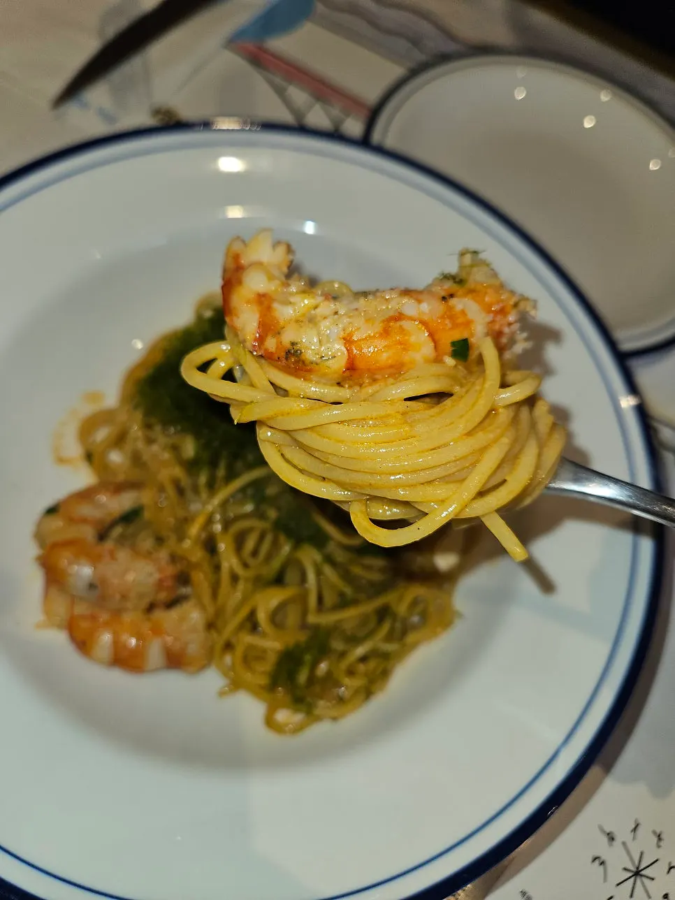Fork lifting bisque cream pasta