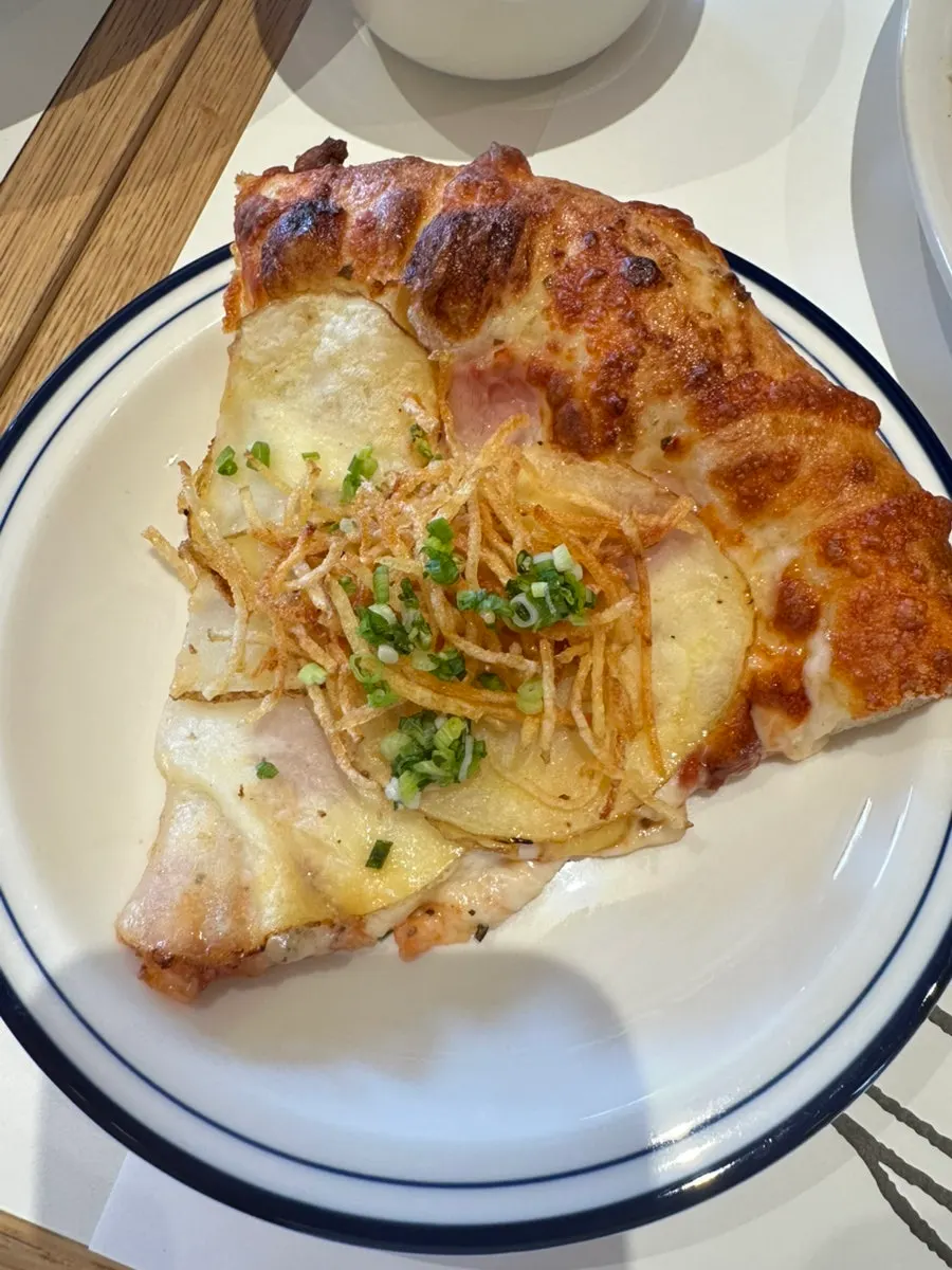 A slice of the potato pizza
