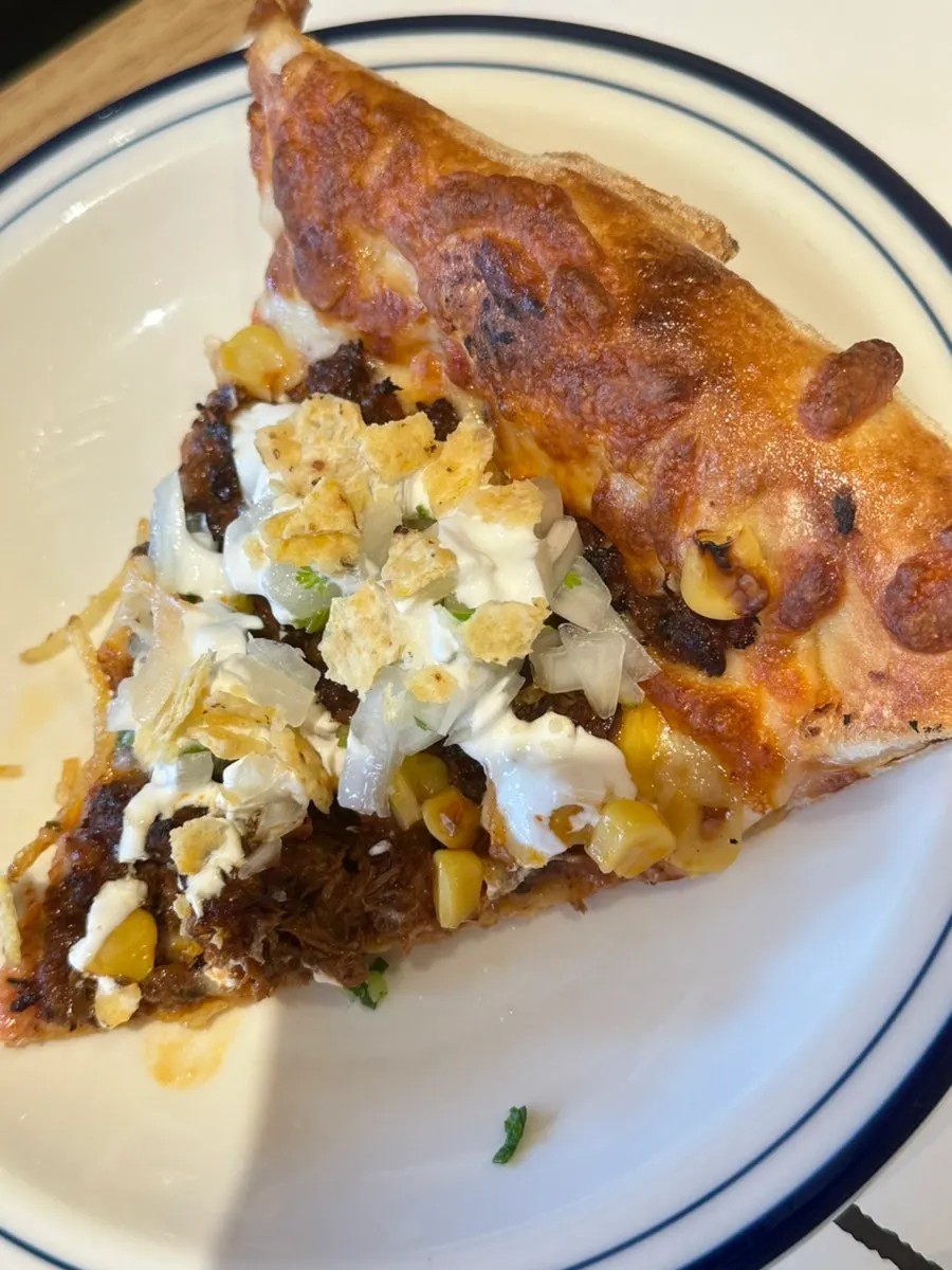 Birria pizza topped with rich meat flavor