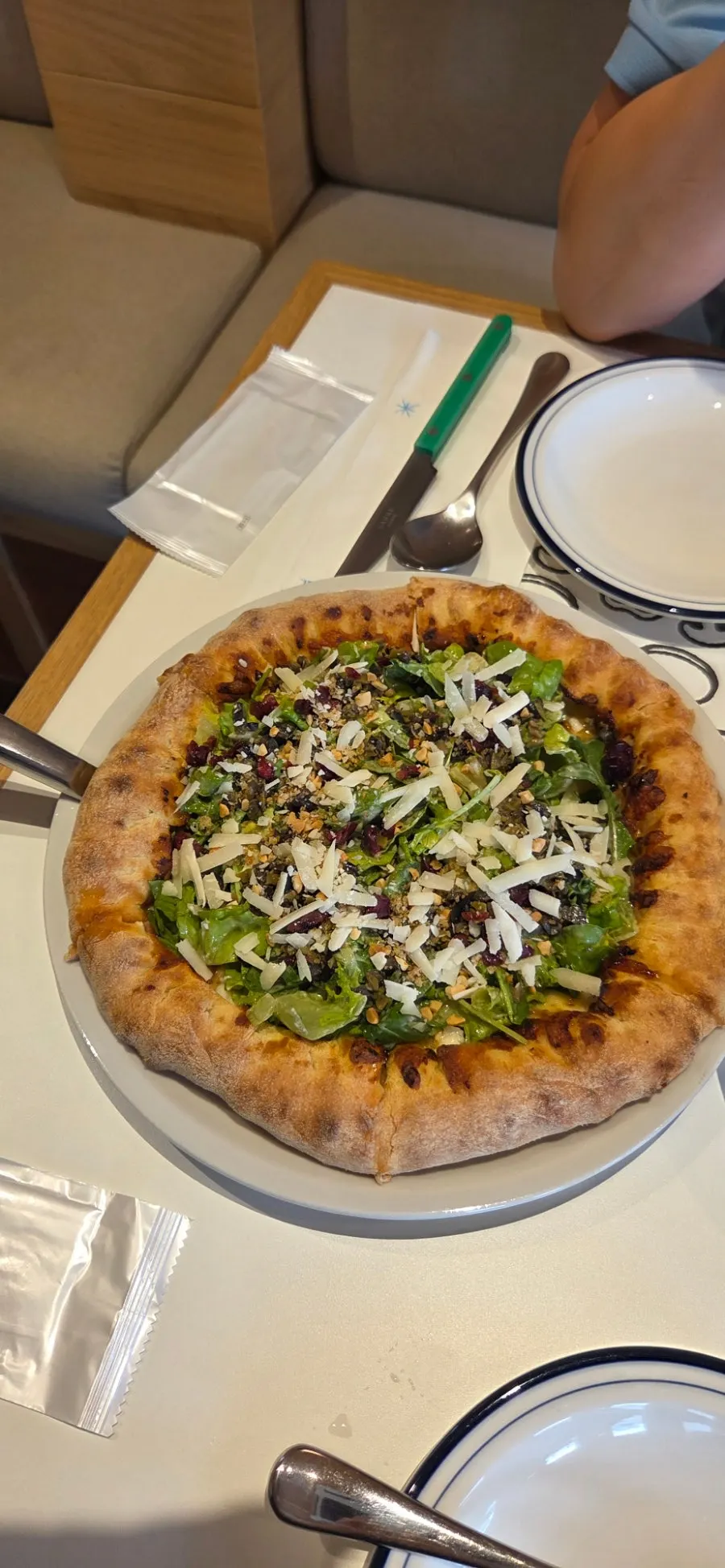 Cross-section of a slice of salad pizza