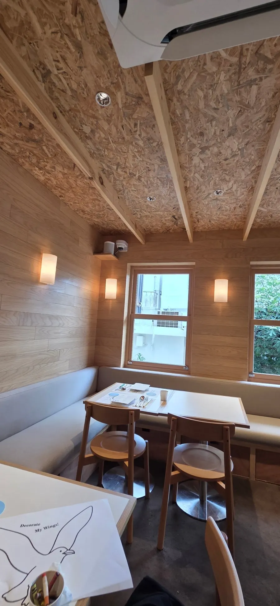 Extra Mile's wall sofa seating
