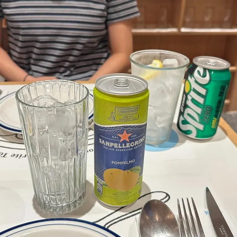 Table with house salad and drinks