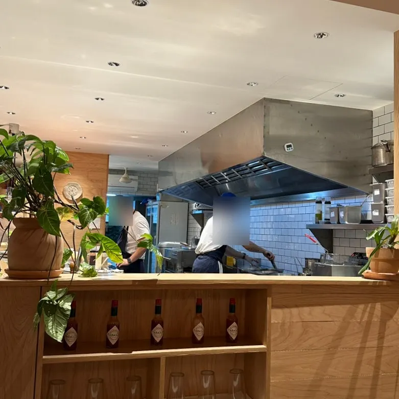 Two-person table with pizza, pasta, and salad together