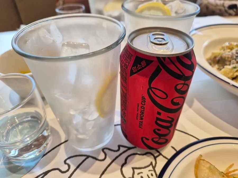 Ice cups set out for the group alongside Zero Coke