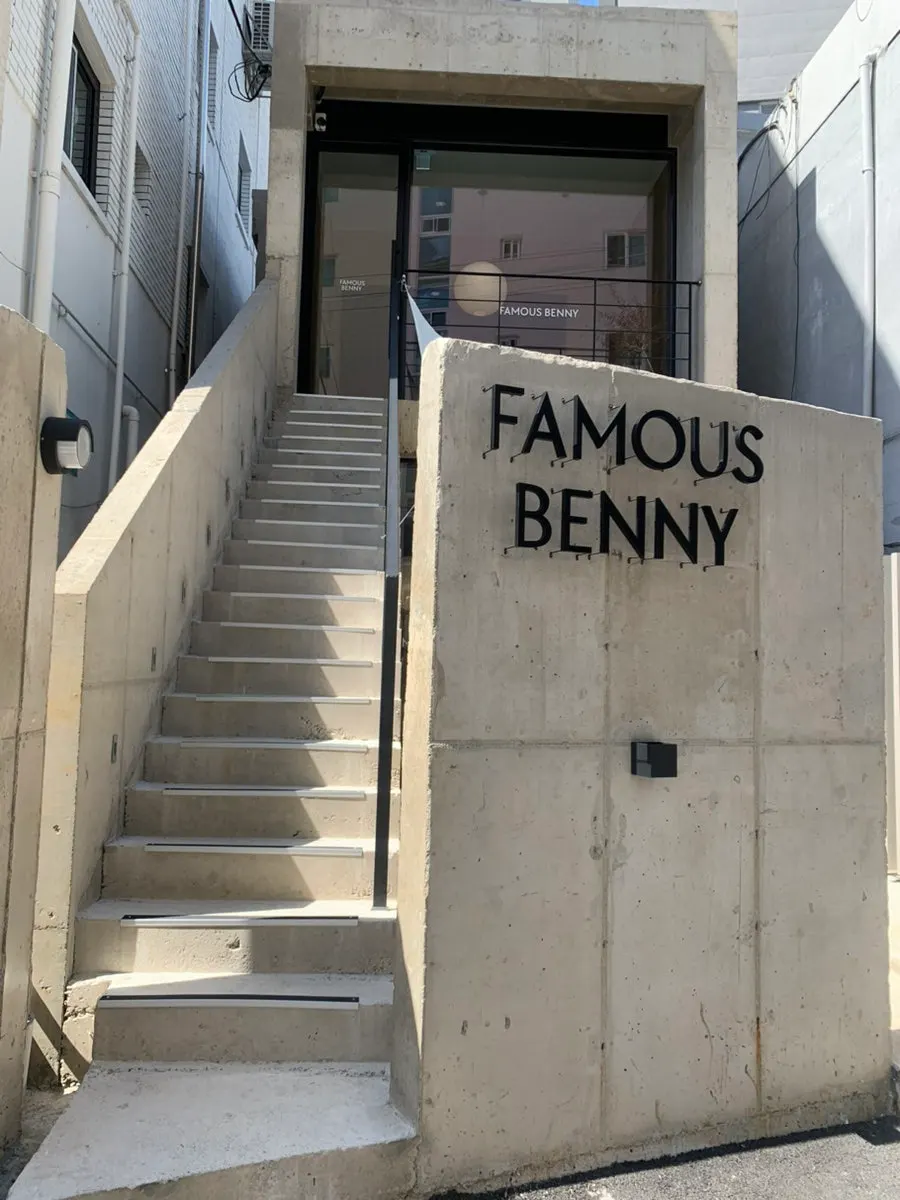 Entrance of Famous Benny Gwangalli Branch, one block in from the running course