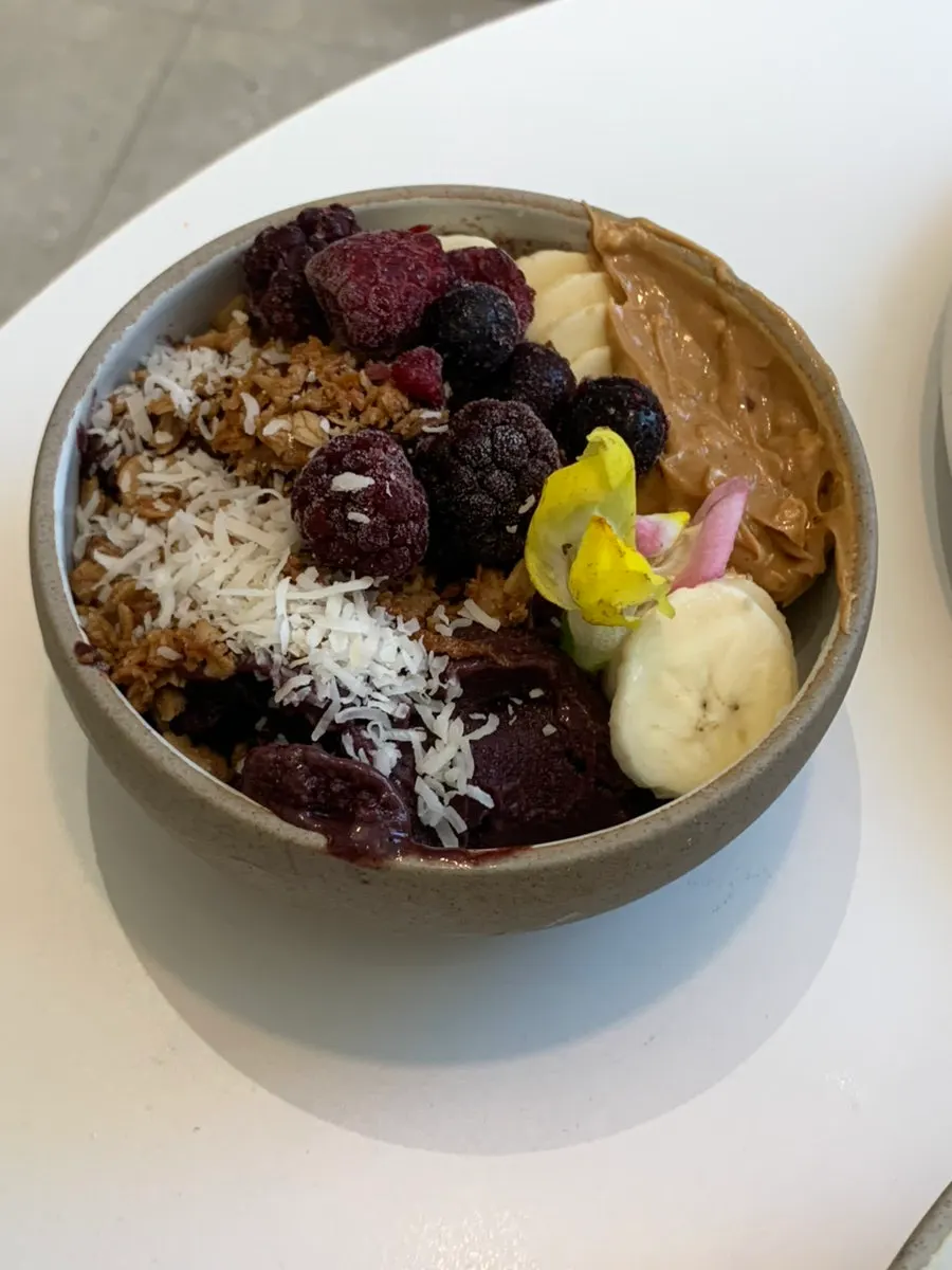 Acai bowl topped with banana and granola
