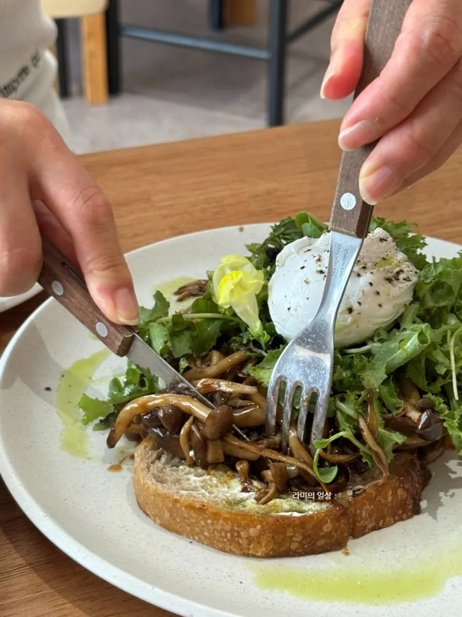 Grilled mushroom toast with mushrooms, egg, and sourdough