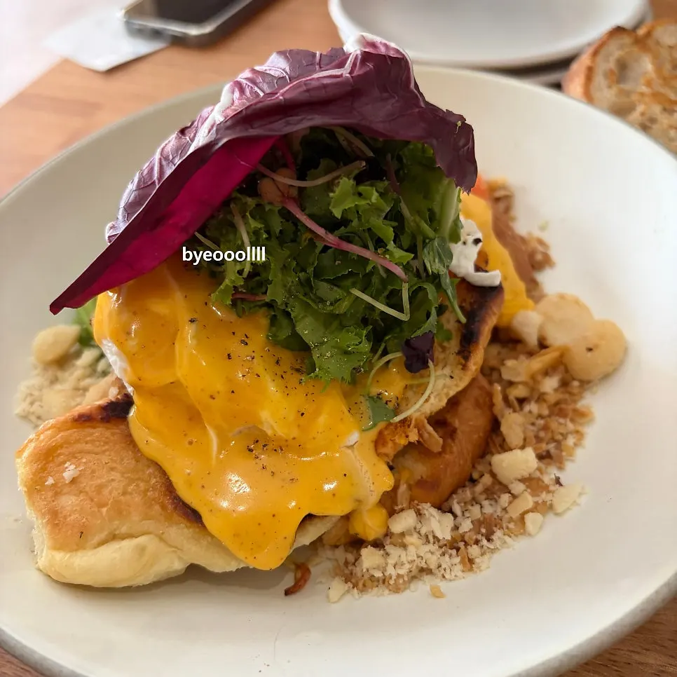 Plated dish of The Famous Benny with salmon