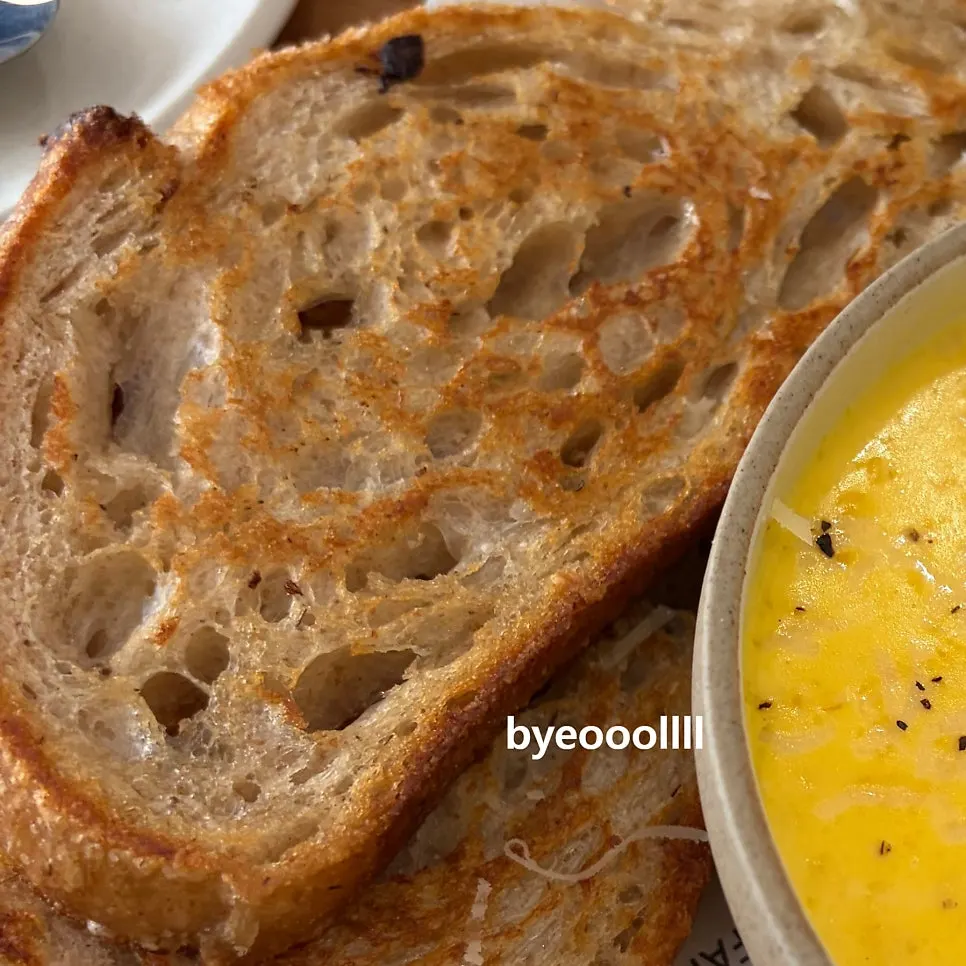 Crisp baked bread served alongside the soup