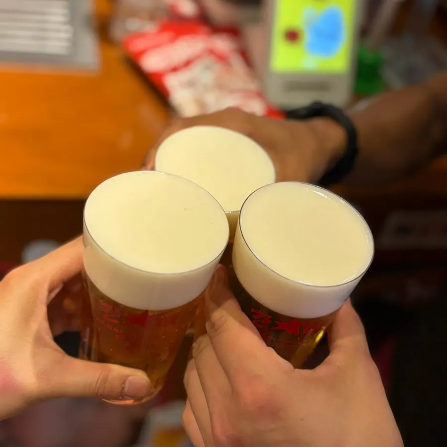 Pouring draft beer into a chilled glass