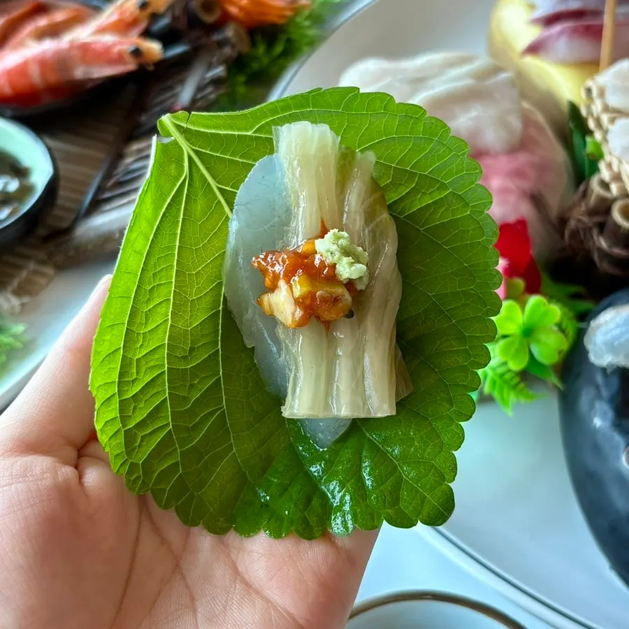 Sashimi and sushi wrapped with seaweed