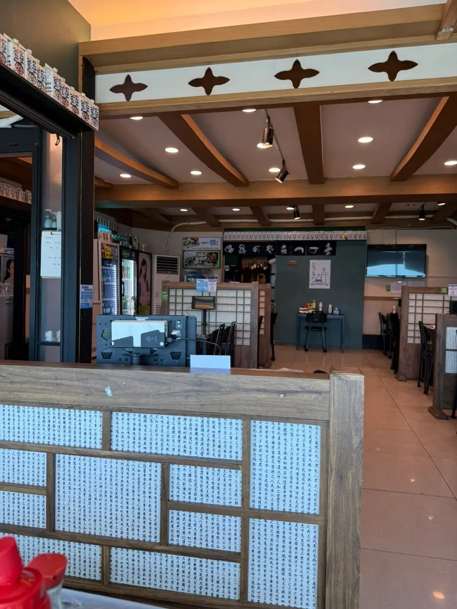 Window table seating with ocean view at Geumrang Hoetjip