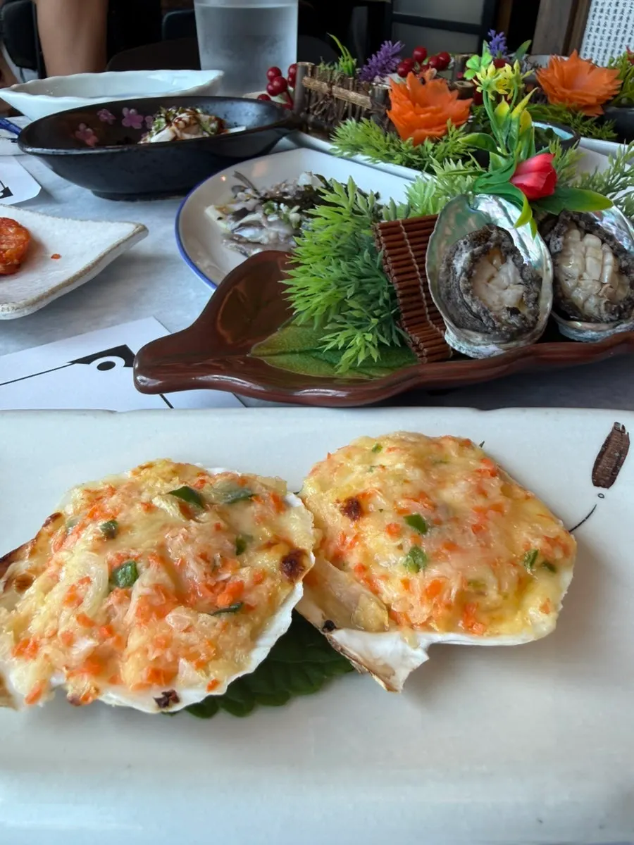 A plate of seasonal sashimi mixing flounder and rockfish