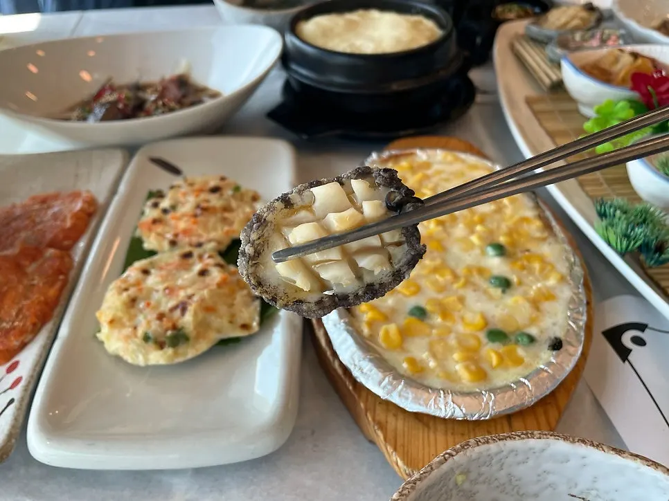 Spread of steamed abalone, sea squirt, gaebul, sea cucumber, and boiled octopus