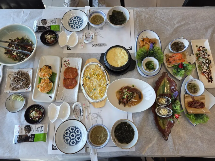 Assorted seafood plate with abalone, sea squirt, spoon worm and sea cucumber