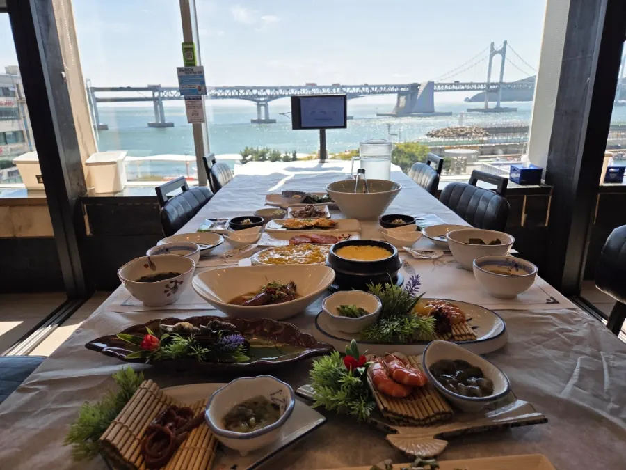 Table at Geumrang Hoetjip packed full with banchan