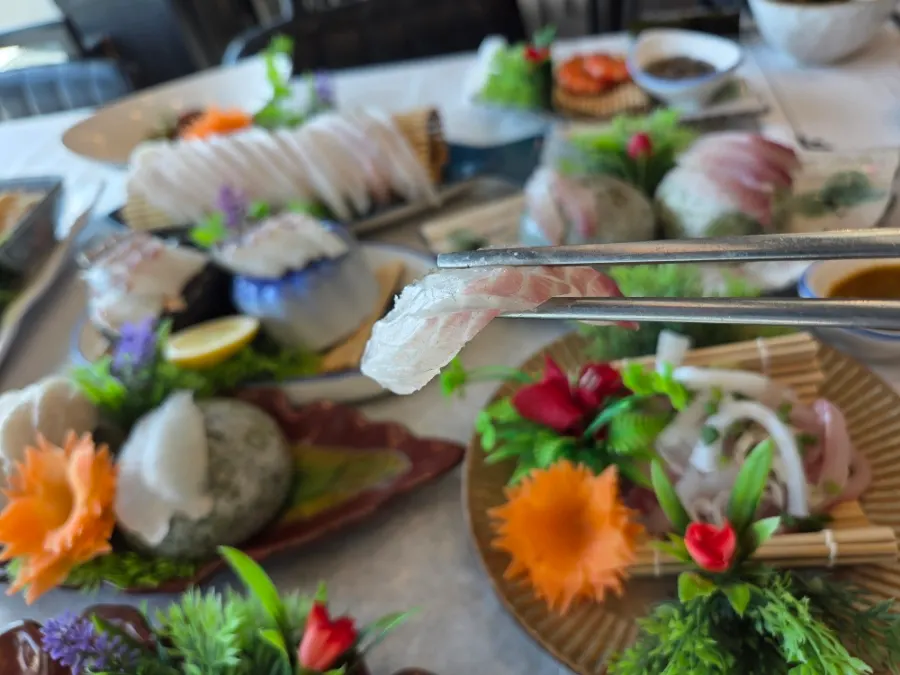 Halibut flesh and fin sashimi pieces