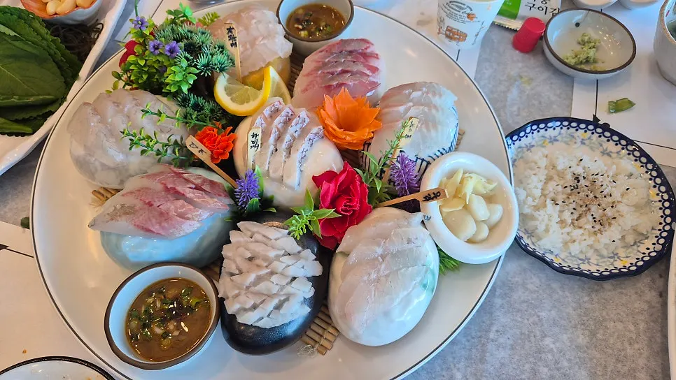 Premium assorted sashimi plated on stone